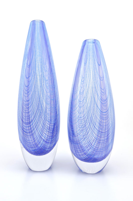A pair of sommerso modern glass vases with blue cane
